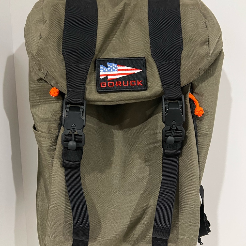 Green and Black Backpack with Sturdy Straps and Flag Patch